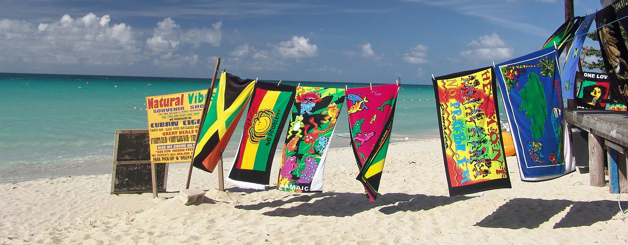 jamaican flags on a beach